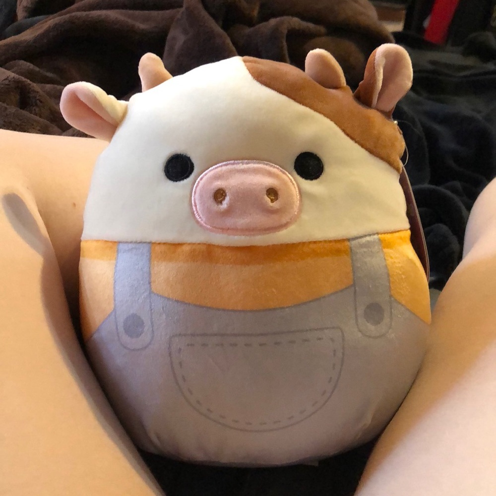 cow squishmallow wearing overalls 😀